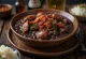 Feijoada са усољеном говедином сервирана са свежим першуном и прилогом од пиринча