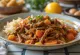 Карне Мечада сервирана са арепом и пиринчем